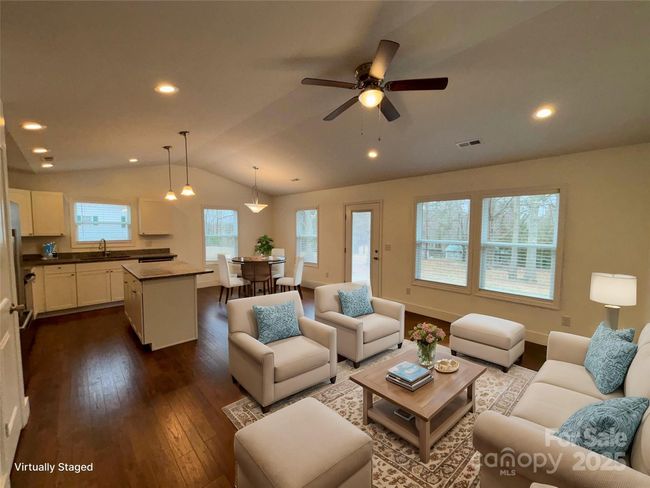 This 24' x 16' space opens out to a cement patio and large back yard. | Image 5