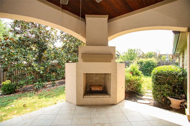 View of patio / terrace with exterior fireplace | Image 35