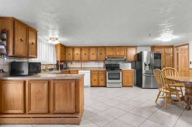 Kitchen in lower level | Image 7