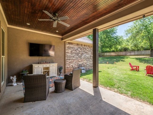 View of patio / terrace featuring ceiling fan and a fenced backyard | Image 32