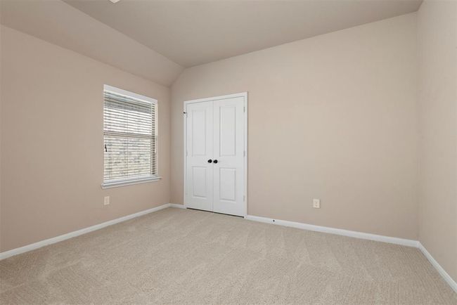 Bedroom #3 up with tall ceiling and walk in closet. | Image 31