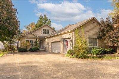 View of front of home with a garage | Image 1