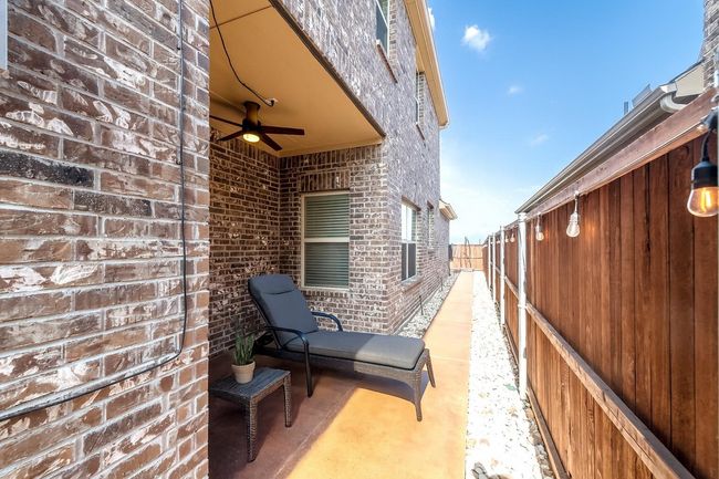 View of patio / terrace featuring a ceiling fan | Image 32