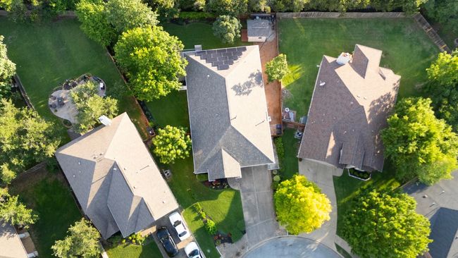 Aerial view shows an overhead view of the beautiful property. Also notice the solar panels (they are owned). | Image 27