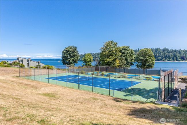 Beach Club with pickle ball courts. Indoor and outdoor pools. Private beach area. | Image 36
