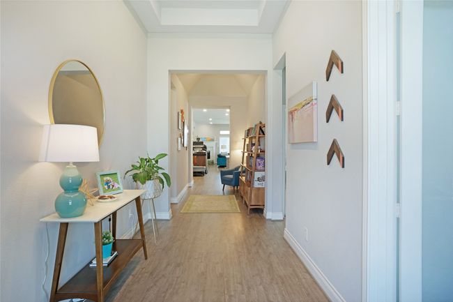 Corridor with wood finished floors and baseboards | Image 9