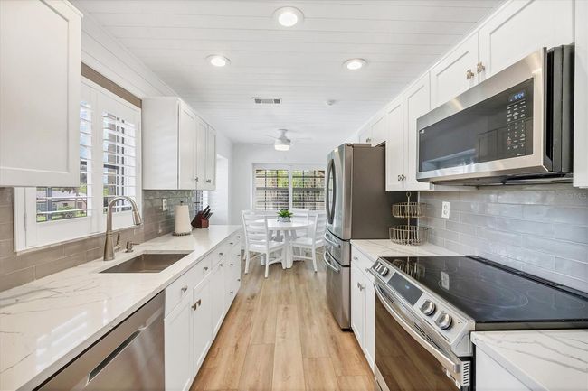 KITCHEN WITH SHIP LAP CEILING AND WALLS | Image 15