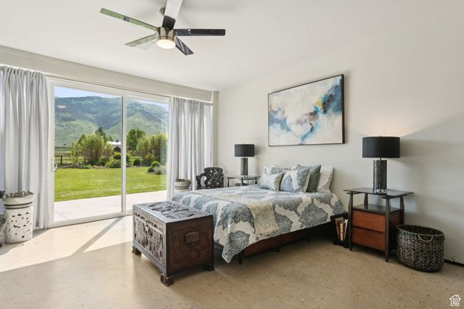 Bedroom with access to exterior, a mountain view, and ceiling fan | Image 26