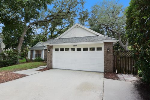 1672 Countrywood St, TARPON SPRINGS, FL, 34689-8038 | Card Image
