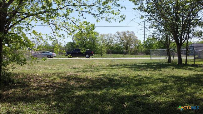 Ground view of property facing east (street) | Image 6