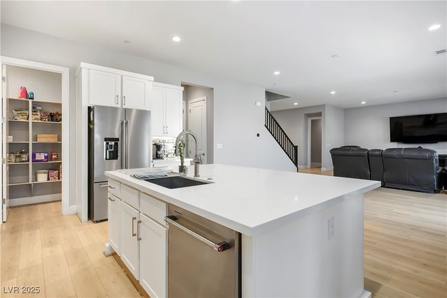 Breakfast Bar, Sink, Dishwasher, Entry to Pantry. | Image 6