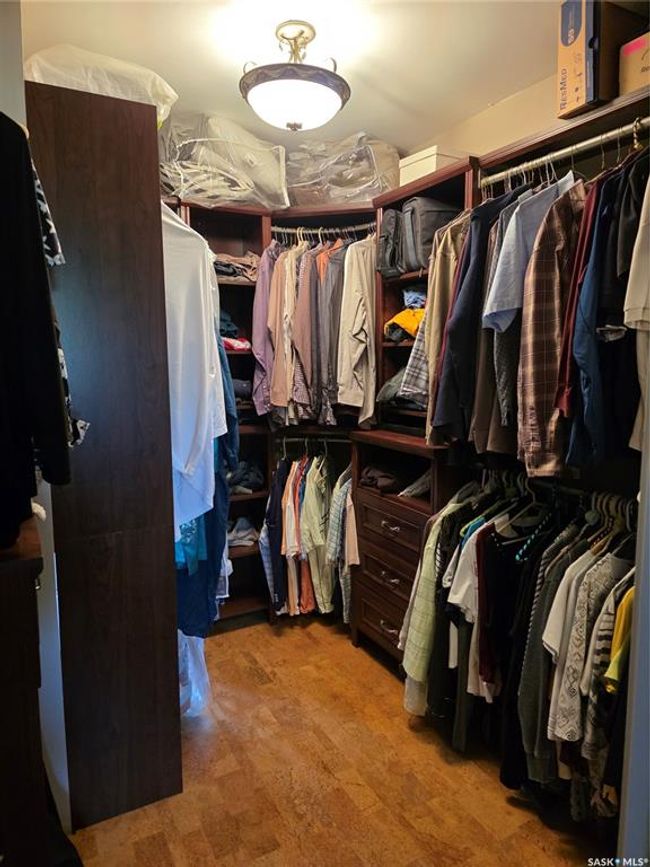 View of walk in closet | Image 18