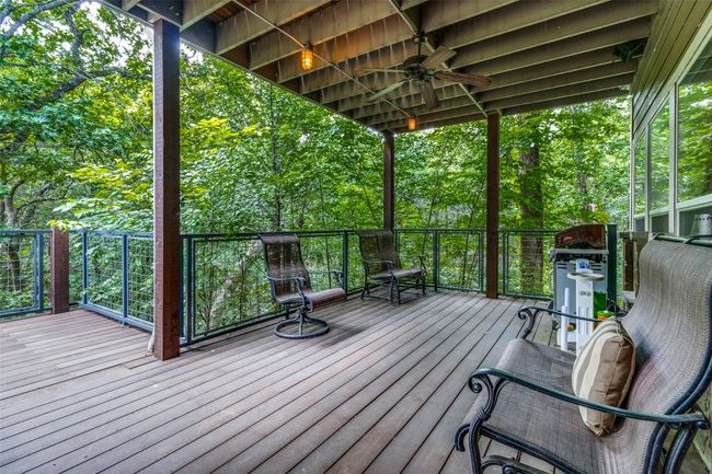 Wooden terrace featuring ceiling fan | Image 30