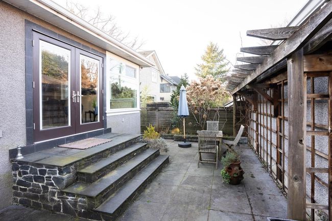 View of patio / terrace with a fenced backyard, entry steps, and french doors | Image 31