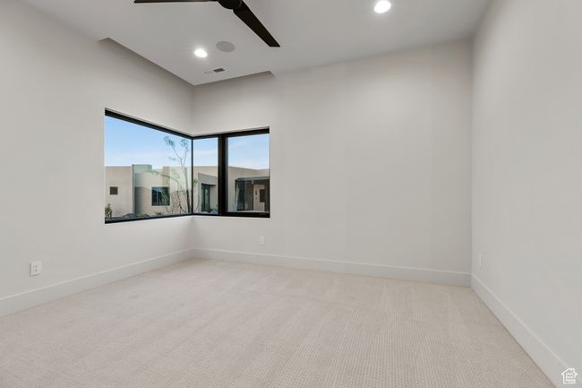 Carpeted empty room with ceiling fan, baseboards, visible vents, and recessed lighting | Image 42