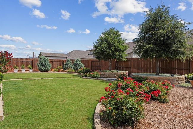 Beautifully landscaped and fully fenced back yard | Image 28