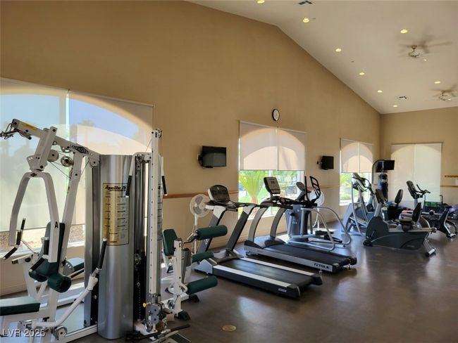 Workout area with recessed lighting and high vaulted ceiling | Image 12
