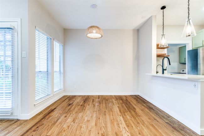 Unfurnished dining area with wood finished floors | Image 5