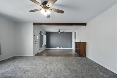 VIEW OF DINING AREA AND FRONT DOOR. DOORWAY TO THE RIGHT GOES INTO THE KITCHEN. | Image 2