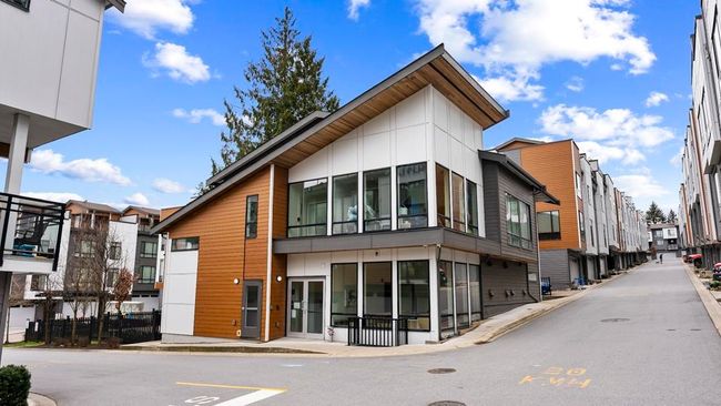 View of building exterior with a residential view | Image 11