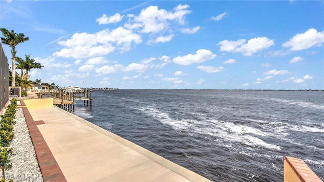 Captains Walk featuring a water view | Image 7