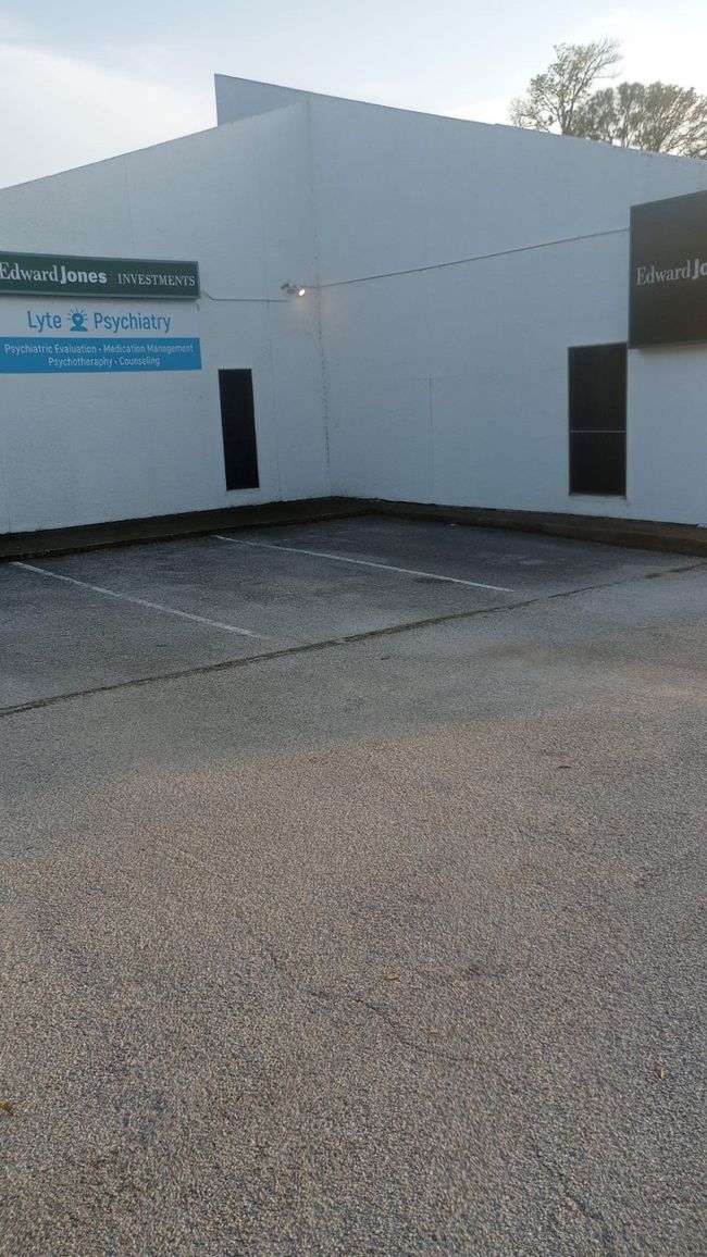 View of property featuring uncovered parking | Image 7