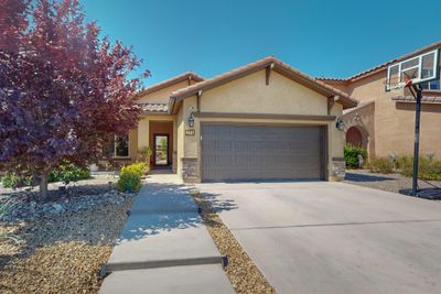 9627 Iron Rock Drive Nw, House other with 3 bedrooms, 2 bathrooms and null parking in Albuquerque NM | Image 1