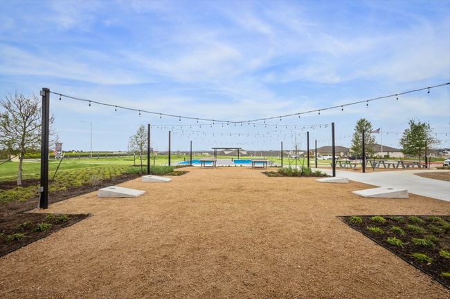 View of home's community featuring a swimming pool | Image 34