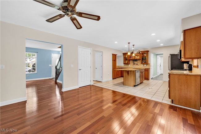 FAMILY ROOM OPEN AND ADJOINGING TO UPDATED CLASSIC KITCHEN | Image 7