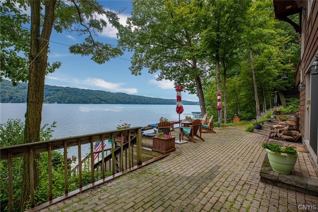 Stair leads from the patio to the dock. | Image 35