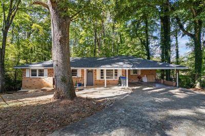 422 White Oak Drive Nw, House other with 5 bedrooms, 3 bathrooms and null parking in Lilburn GA | Image 1