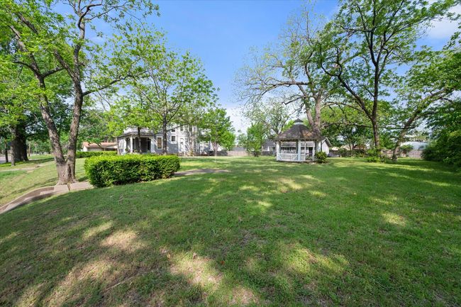 View of grassy yard with a gazebo | Image 29