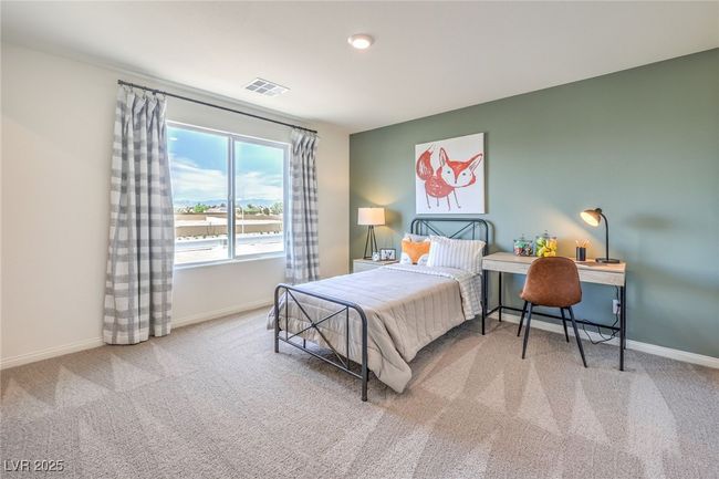 Photo is representational only; actual home finishes may vary. Bedroom featuring carpet and baseboards | Image 30
