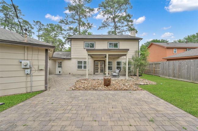 Another view of the expansive brick paver patio. | Image 27