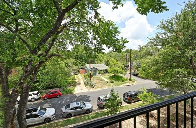 Balcony overlooks the neighborhood for another way to feel like you're in an attached single family home versus a condo | Image 26