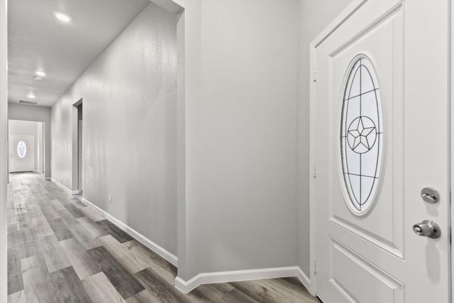 Entrance foyer featuring hardwood / wood-style floors | Image 24