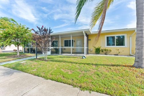 1013 Rickenbacker Dr, SUN CITY CENTER, FL, 33573-5445 | Card Image