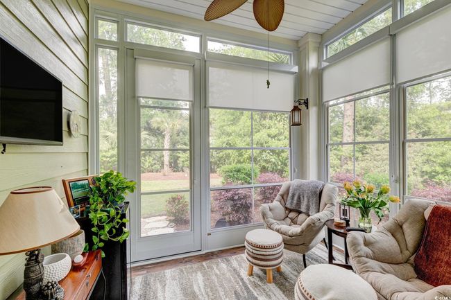 Sunroom / solarium with wooden walls and plenty of natural light | Image 15