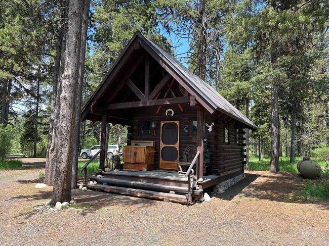 Log home featuring log siding | Image 25