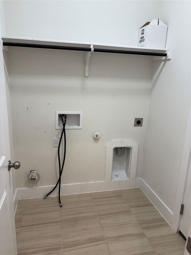 Laundry room with hookup for a gas dryer, hookup for a washing machine, baseboards, and electric dryer hookup | Image 4