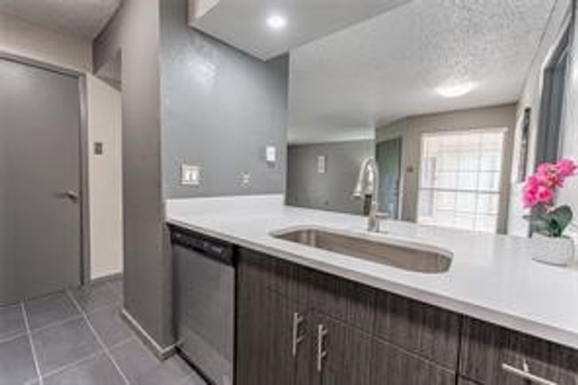 Bathroom with vanity and tile patterned floors | Image 15