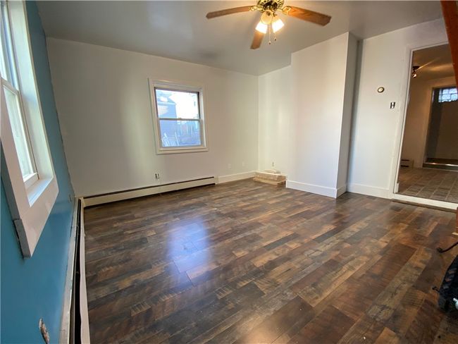 Spacious LR w/plenty of light on the lower level | Image 8