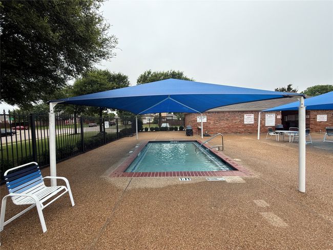 Community pool featuring a patio | Image 36