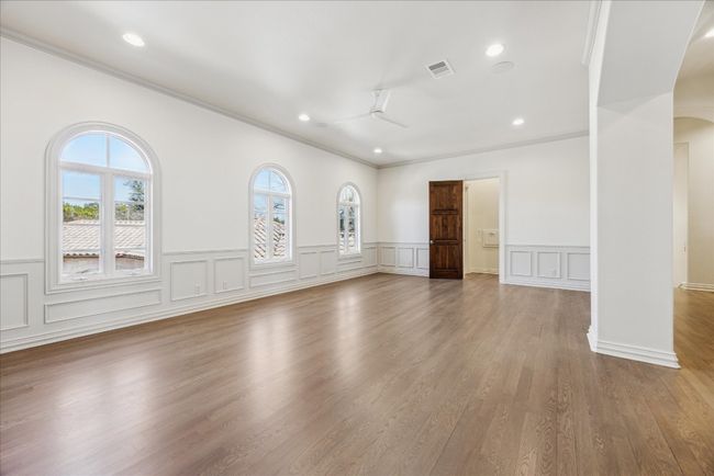 This upper level room is perfect for use as a play/flex room. | Image 29