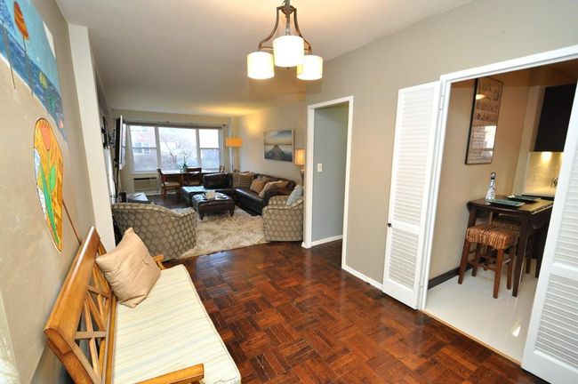 Dining Foyer featuring baseboards and a notable chandelier | Image 25