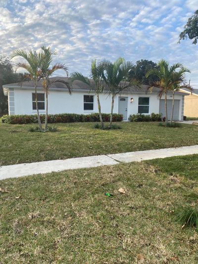 1487 N Mangonia Drive, House other with 3 bedrooms, 2 bathrooms and null parking in West Palm Beach FL | Image 2