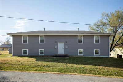 View of front of home with a front lawn | Image 1