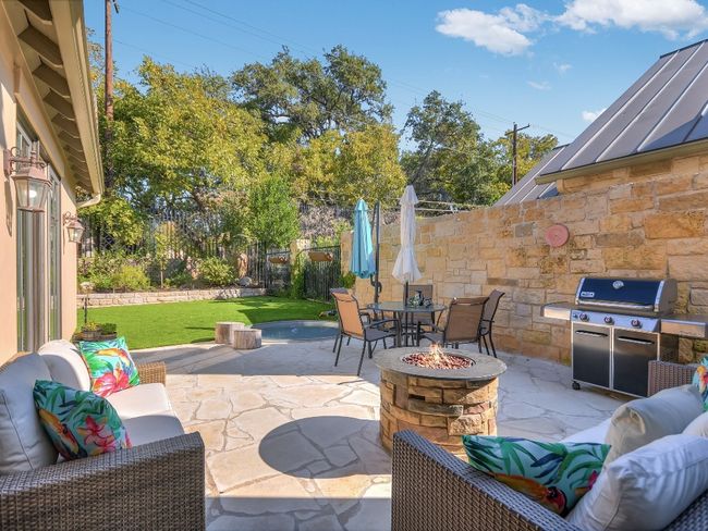 View of patio featuring an outdoor living space with a fire pit | Image 24