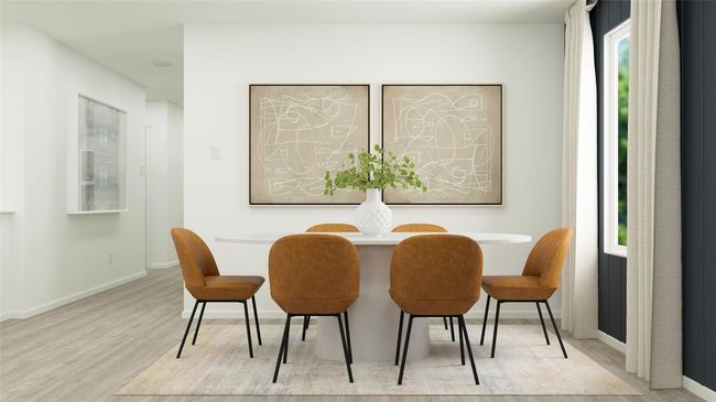 Dining room featuring wood finished floors and baseboards | Image 29