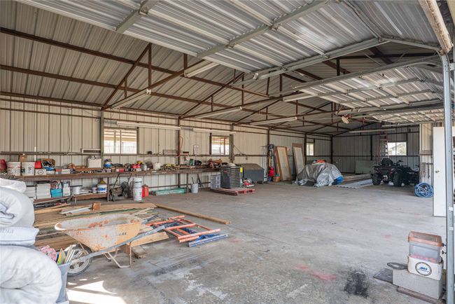 Garage featuring metal wall | Image 27